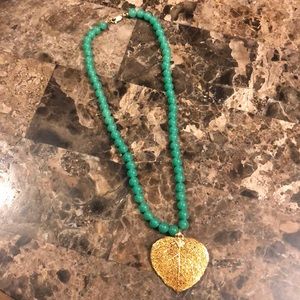 Beaded green necklace featuring gold leaf- NWOT